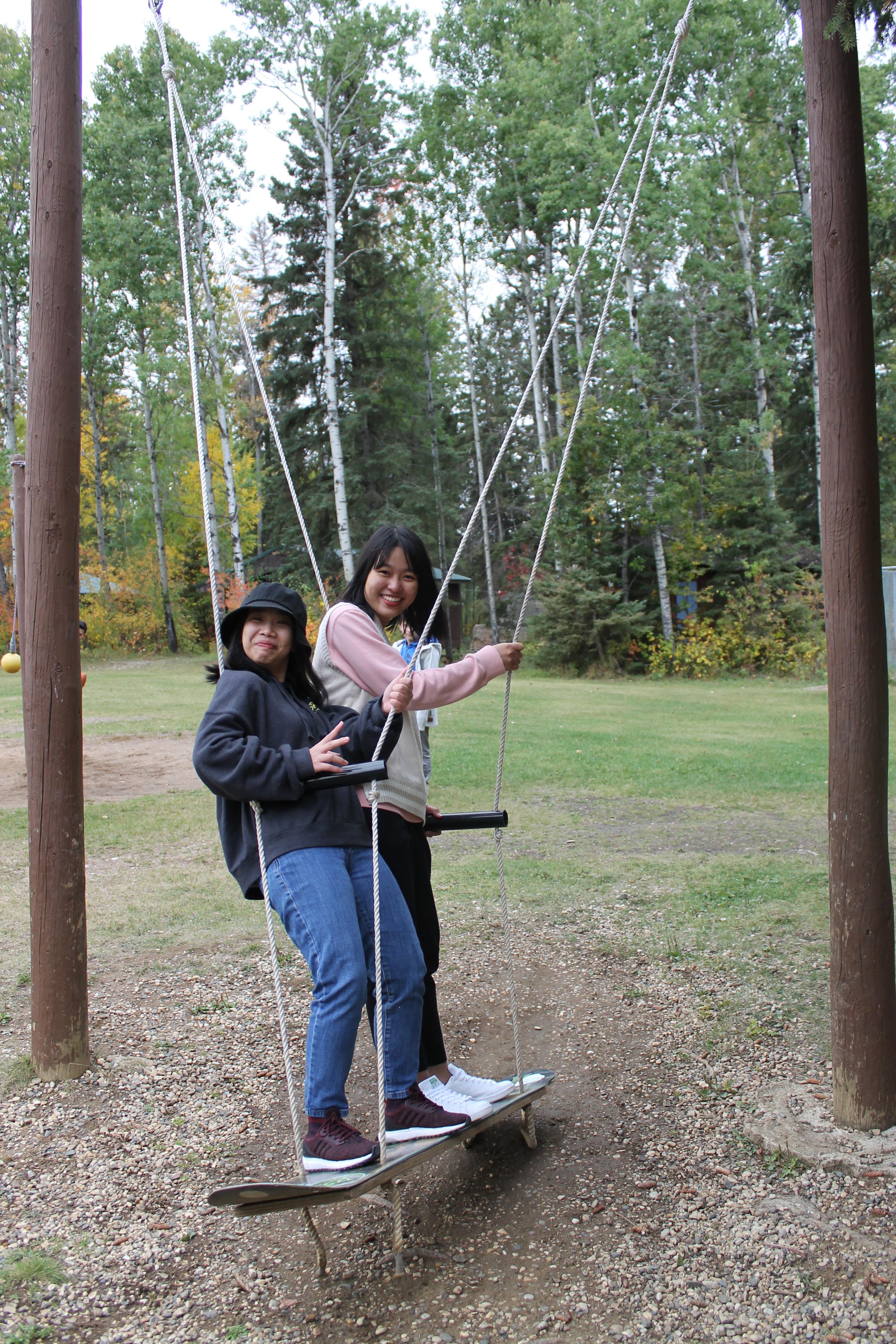 students on swing