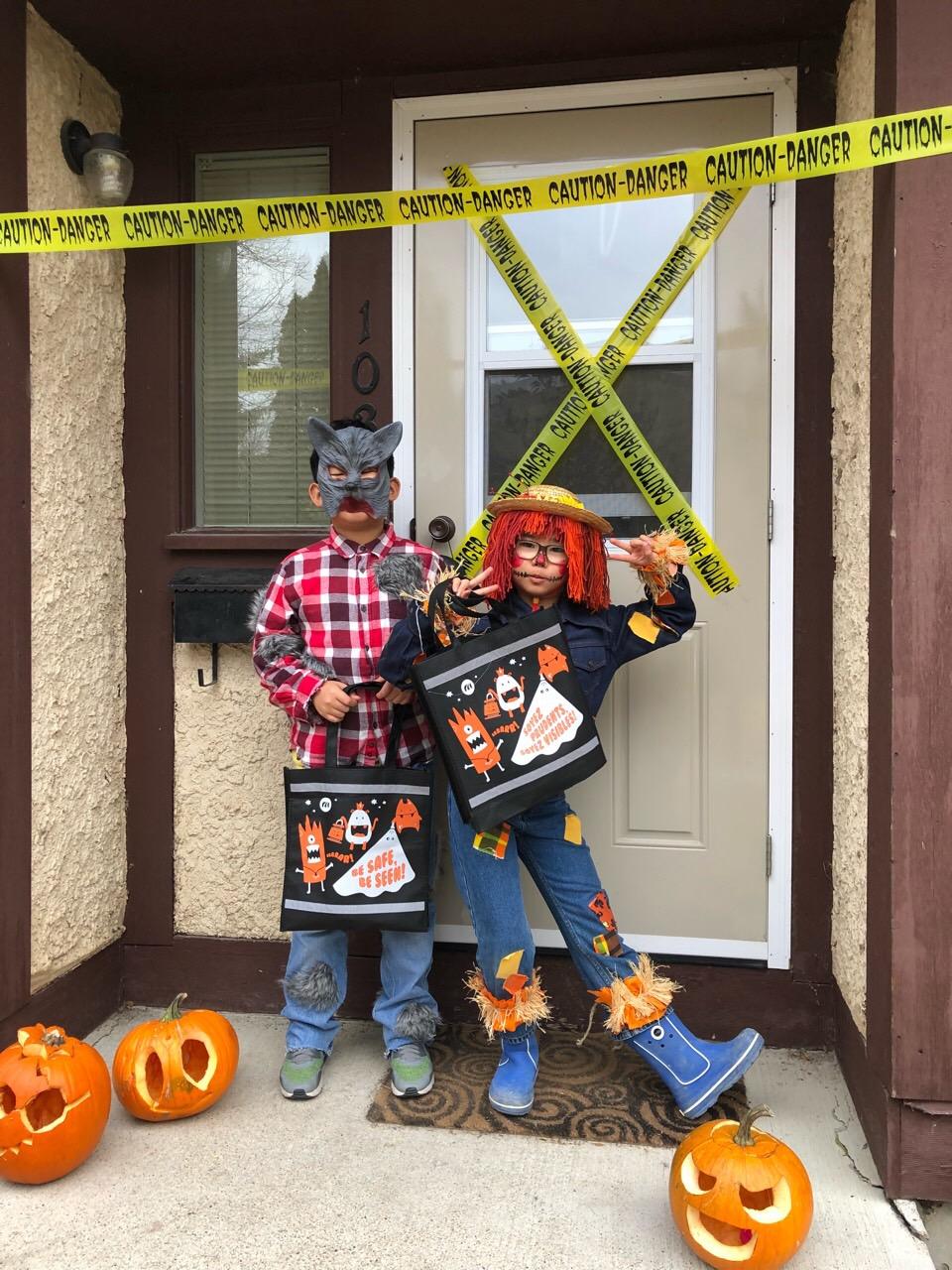 our youngest trick or treaters dresses as wearwolf and scarecrow