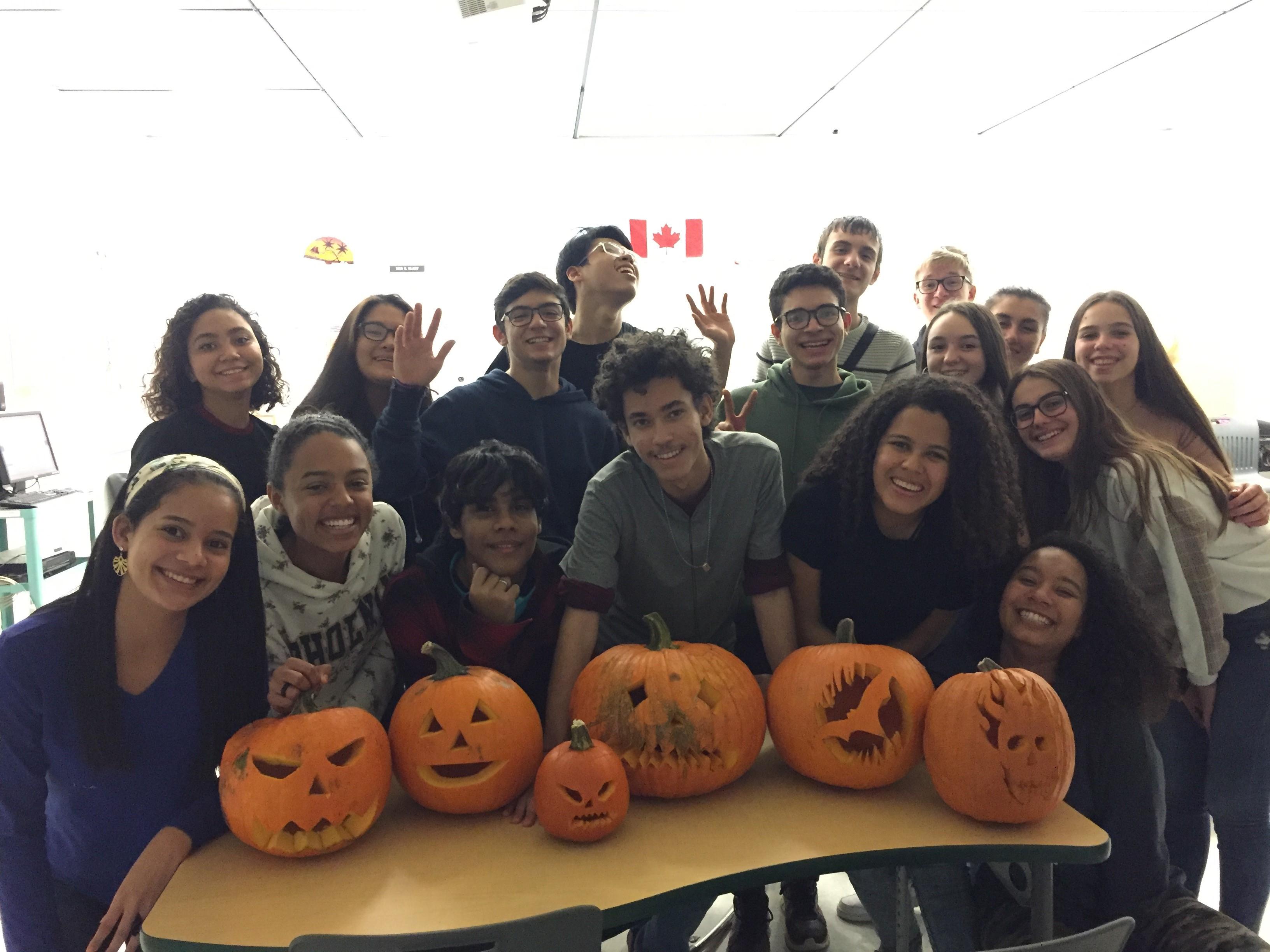 English Class students and their pumpkins